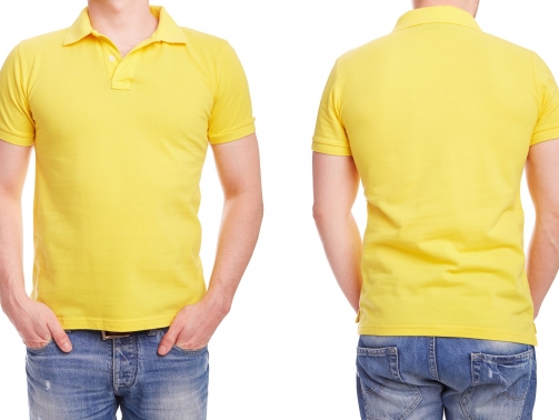A young man with a yellow polo shirt on a white background